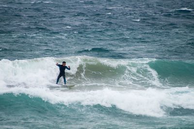 Man surfing in sea