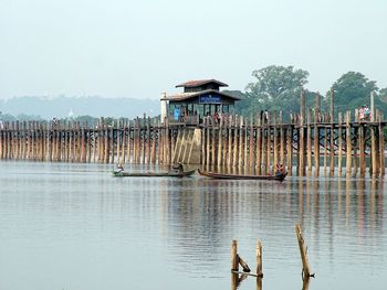 U bein bridge crosses taungthaman lake near amarapura. the 1.2km bridge was built around 1850 