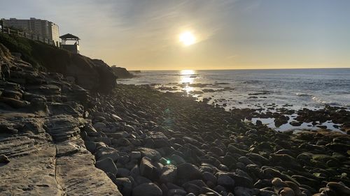 Scenic view of sea against sky during sunset