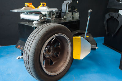 Close-up of vintage car against blue sky