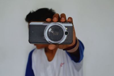 Teenage boy looking away from camera