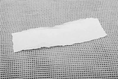 High angle view of piano and white table