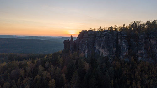 Scenic view of landscape against sky during sunset