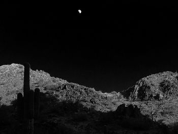 Scenic view of landscape against clear sky at night