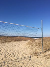 Scenic view of beach against clear sky