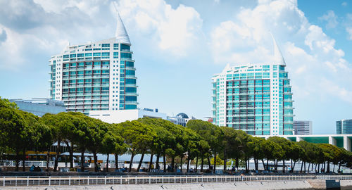 Modern buildings against sky in city