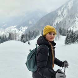 Man in snow mountains against mountain during winter