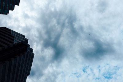 Low angle view of skyscrapers against sky