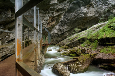 Scenic view of river amidst rock formation