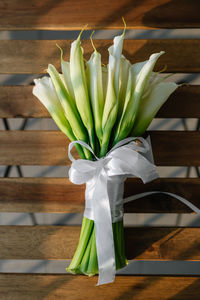 Close-up of white flower vase on table at home