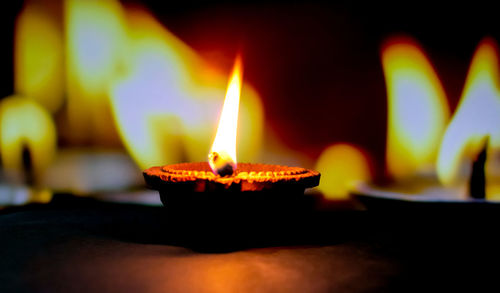 Close-up of lit candle