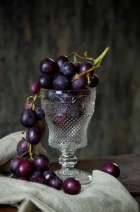 Close-up of grapes on table