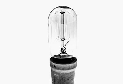 Close-up of electric lamp against white background