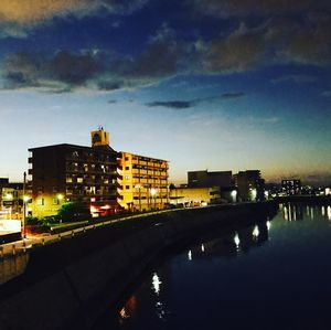 River passing through city at night