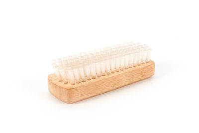 Close-up of piano over white background