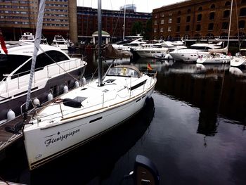 High angle view of boats moored at harbor