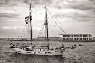 Sailboat on sea against sky