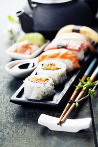 Close-up of sushi served on table