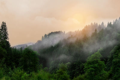 Scenic view of mountains against sky during sunset