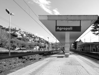 Railroad station platform against sky