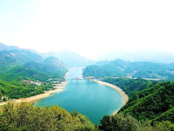 High angle view of plants and mountains against sky