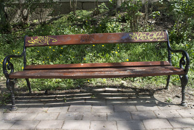 Empty bench in park