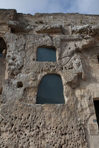 Low angle view of old ruin building