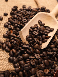 Close-up of coffee beans on table