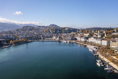 Switzerland, canton of lucerne, lucerne, aerial view of lakeshore city in autumn