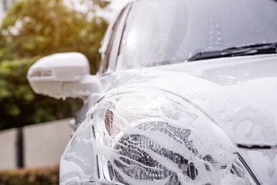 Close-up of wet car
