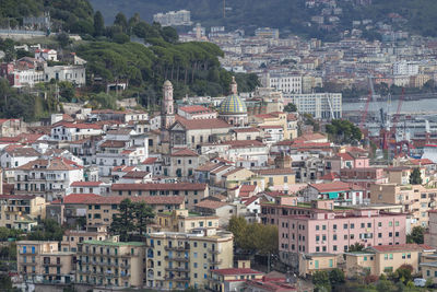 Panoramic view of vietri sul mare and in the background salerno to mean a concept