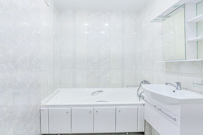 Interior apartment room bathroom, sink, decorative elements, toilet