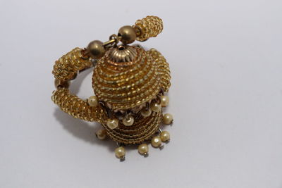 High angle view of electric lamp against white background