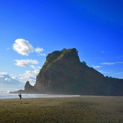 Scenic view of sea against blue sky