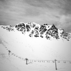 Scenic view of mountains against sky during winter