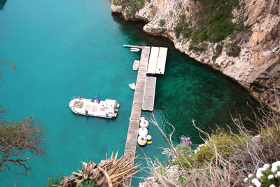 High angle view of sea by cliff