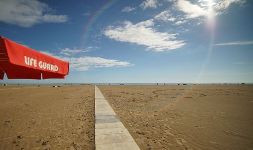 Scenic view of beach against sky