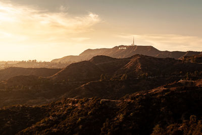 Scenic view of mountains against sky during sunset