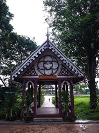 Entrance of temple against building