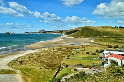 Scenic view of wairarapa coastline against sky