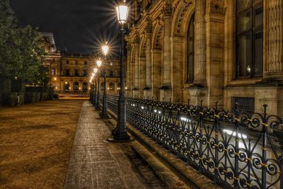 Illuminated street lights at night