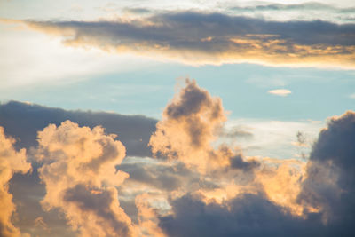 Low angle view of clouds in sky during sunset