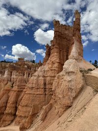 Scenic view of rock formations against sky