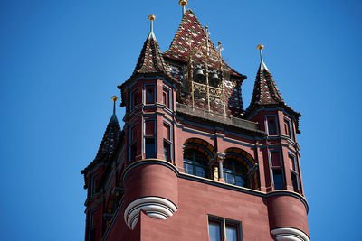 Low angle view of building against blue sky