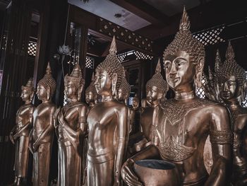 Statue of buddha in temple building