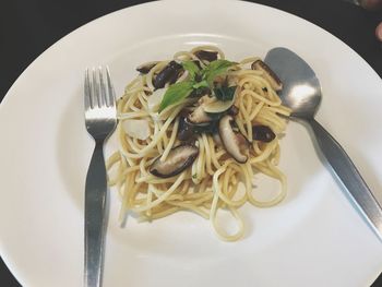 Close-up of pasta in plate on table