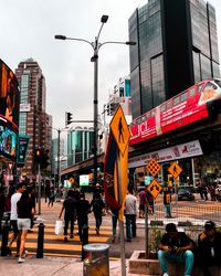 People walking on city street