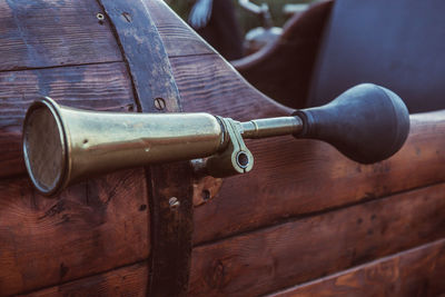 Close-up of old vintage car on wood