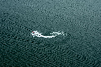 High angle view of boat sailing on sea