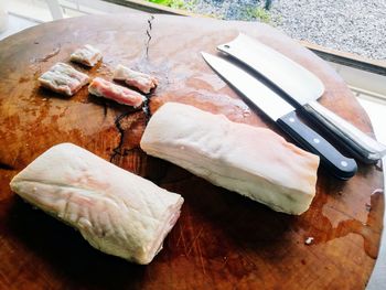 High angle view of meat on cutting board